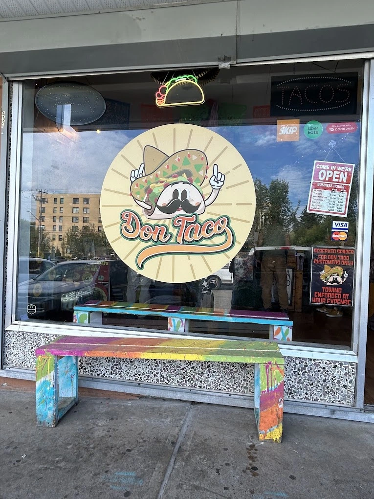Don Taco storefront at 4121 4 St NW, Calgary with logo decal and patio bench